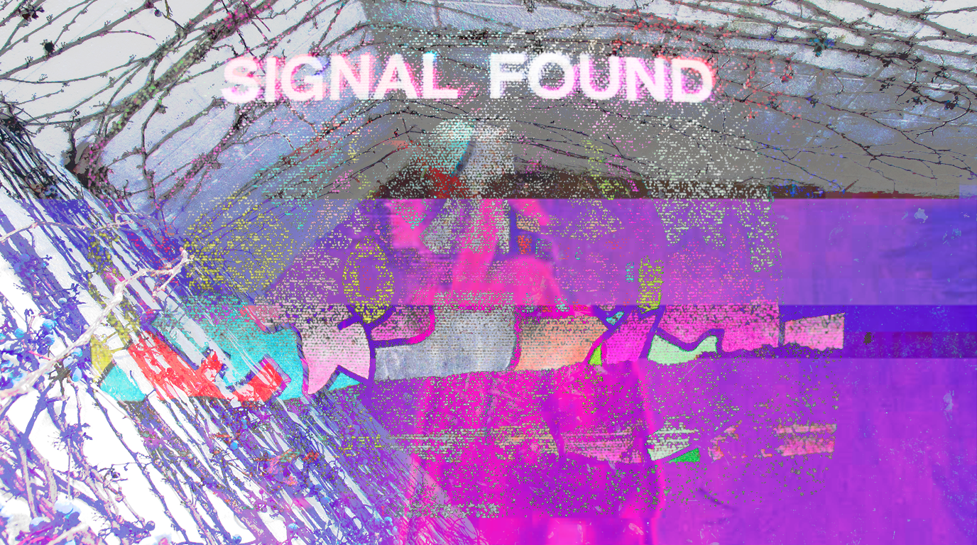  "SIGNAL FOUND" in white text over a shattered field — cracked glass overlays magenta and purple glitch artifacts. A face barely discernible beneath the corruption.